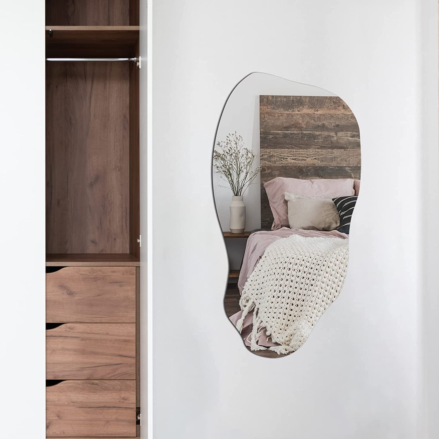 Modern irregular wall mirror, perfect for bedroom, closet, or hallway contemporary decor.
