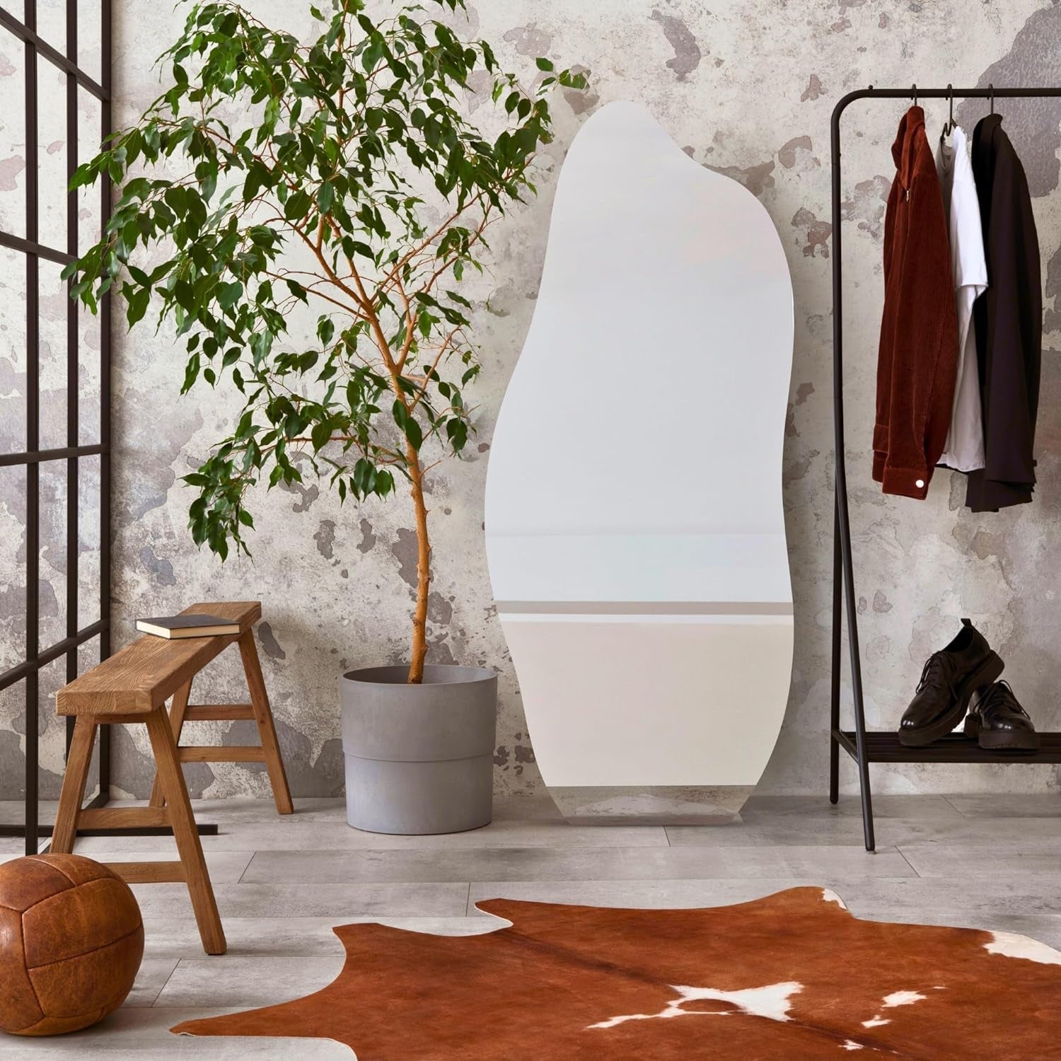 Decorative irregular full-length mirror for bedroom, living room, and modern home decor.
