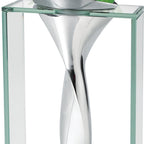 Close-up modern glass and metal vase with sleek twisted design for elegant decor.
