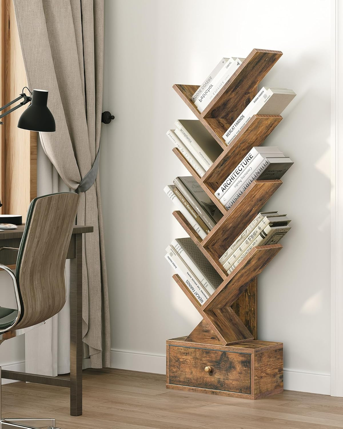 Rustic tree-shaped bookshelf with storage drawer, perfect for books and home office decor.