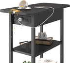 Spill-proof black side table with shelves and built-in charging station.

