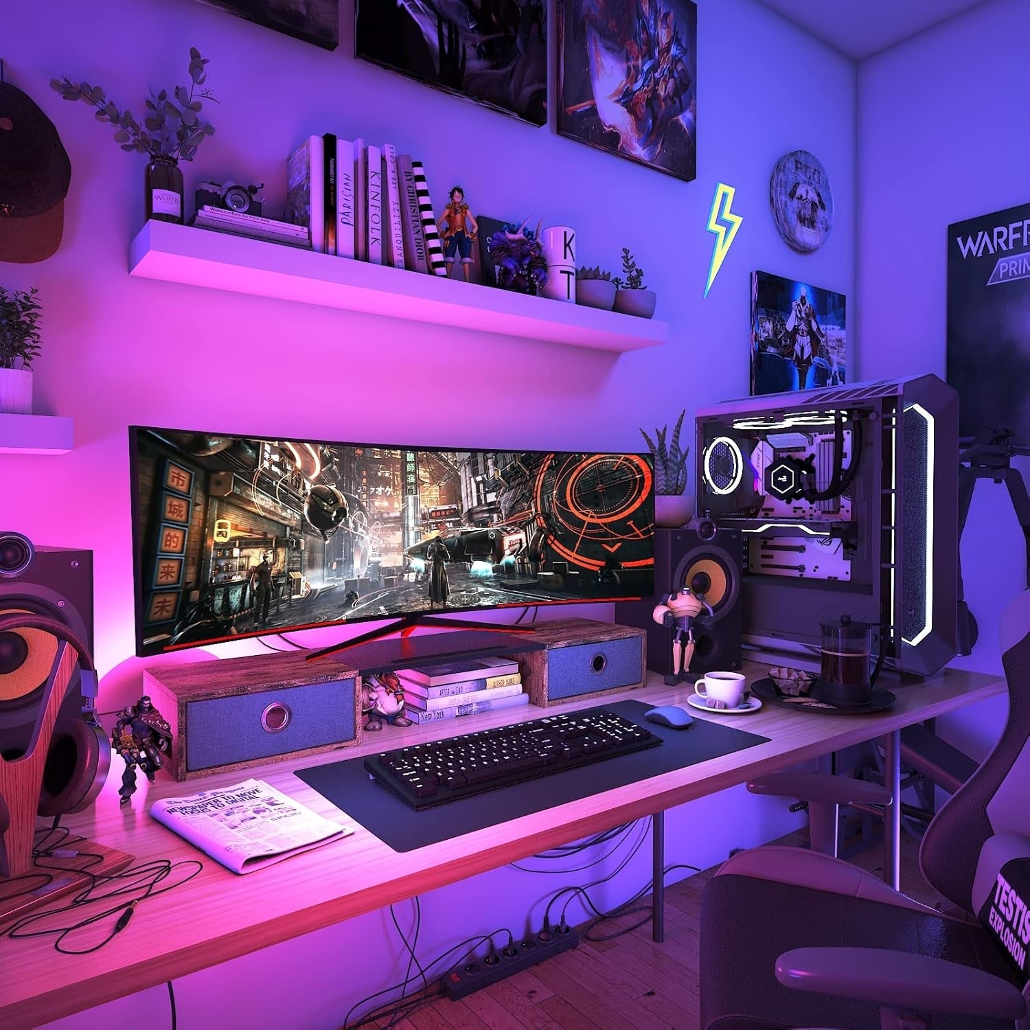 Gaming desk setup with ultrawide monitor on stand and LED lighting