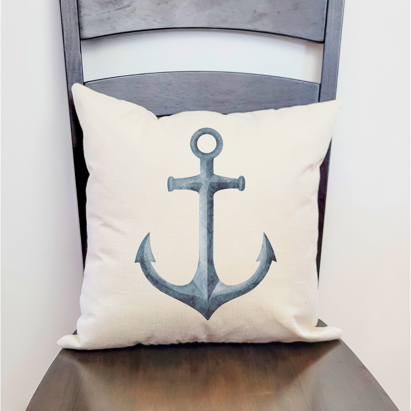 Nautical pillow cover with anchor design, perfect for coastal and beach house decor.
