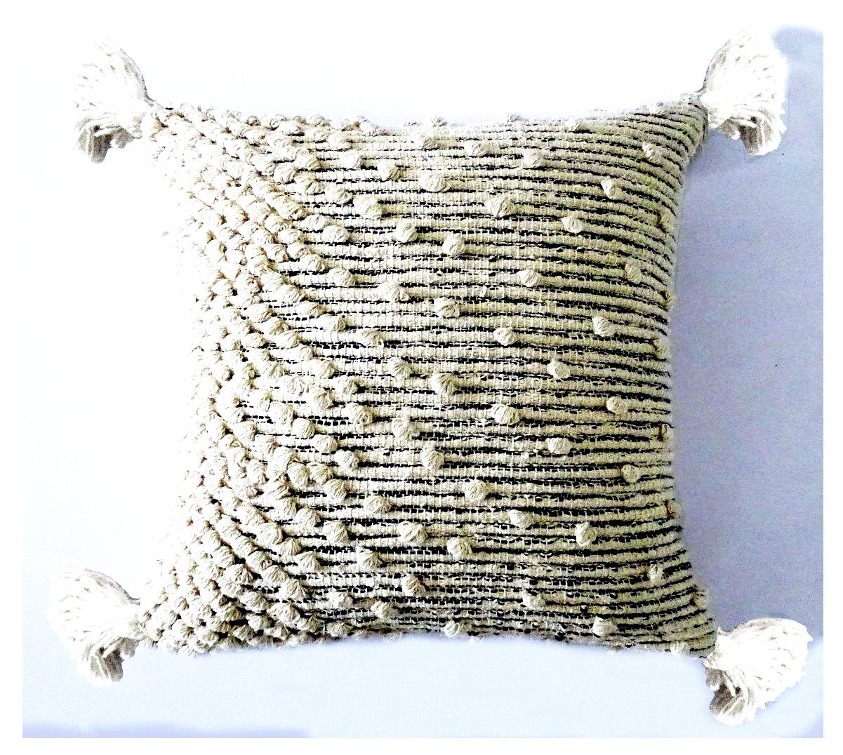 Handwoven boho throw pillow with textured design and tassels for rustic home decor.
