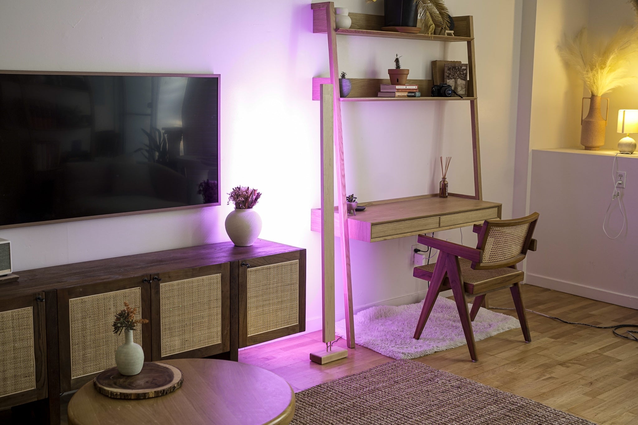Modern wooden LED corner floor lamp with pink ambient lighting for cozy decor.
