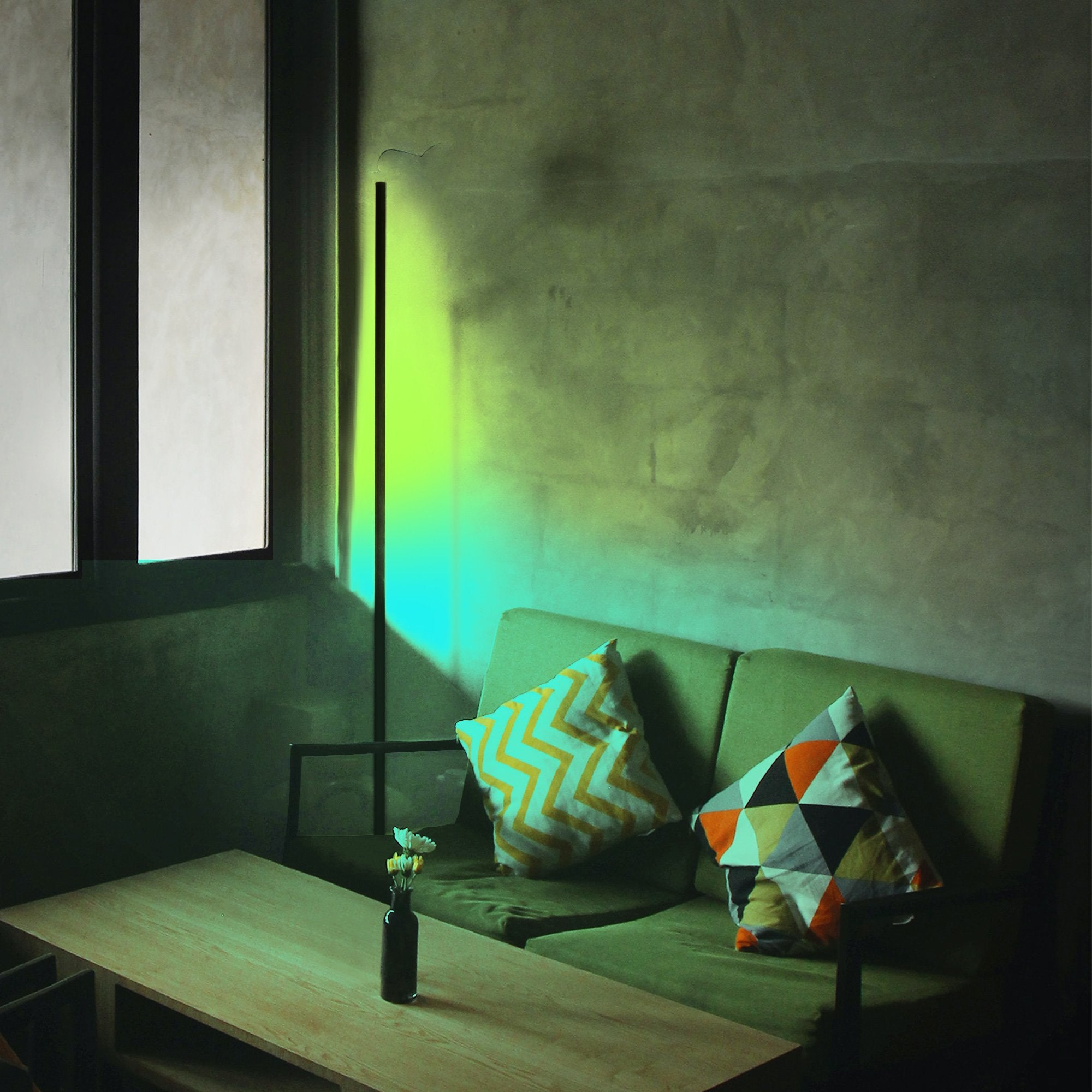 Living room with LED corner floor lamp and green ambient light