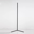 Slim black LED corner floor lamp with tripod base