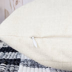 Beige pillow cover with concealed zipper closure for easy insert removal and cleaning.
