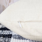 Beige pillow cover with concealed zipper closure for easy insert removal and cleaning.
