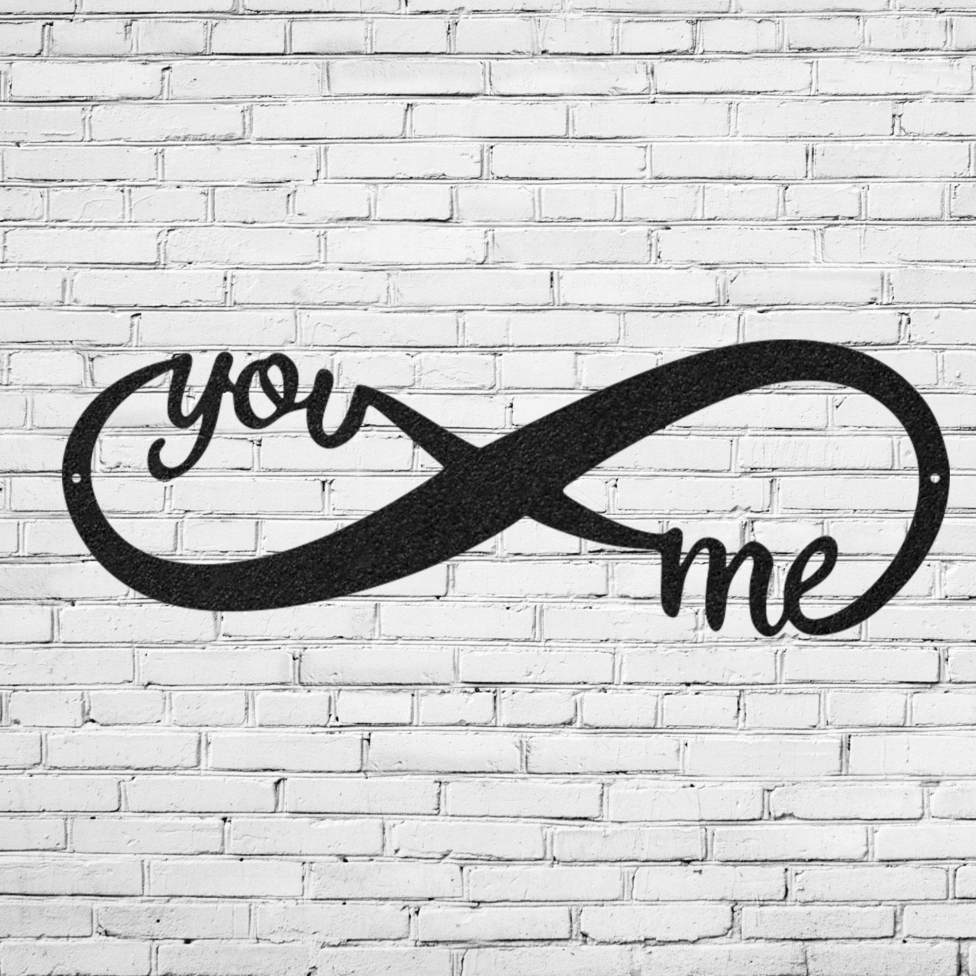 Black infinity wall decor with "You" and "Me" text