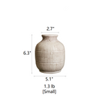 Small ceramic vase (6.3") with textured design for rustic home and table decor.
