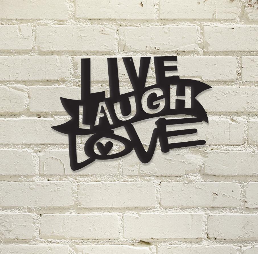 Black "Live Laugh Love" wall decor on white brick background