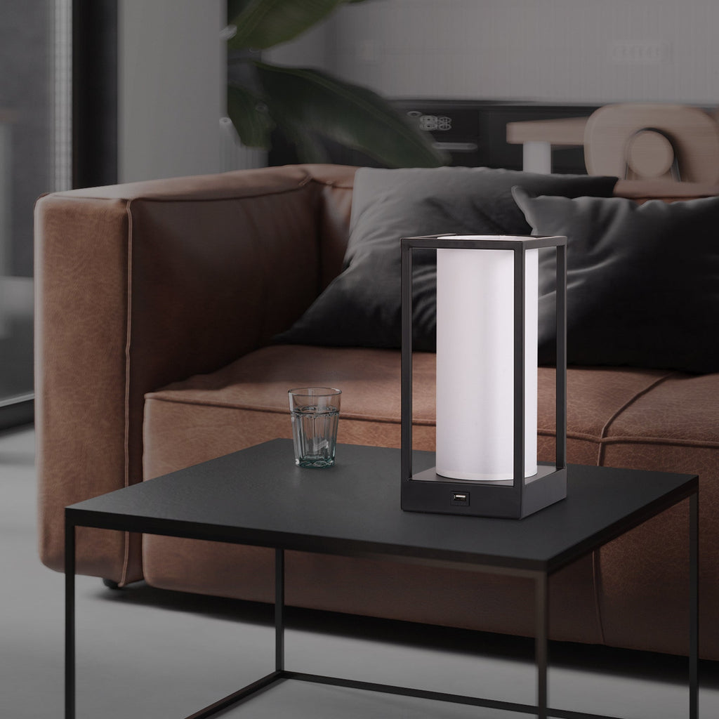 Modern rectangular table lamp with white shade on coffee table
