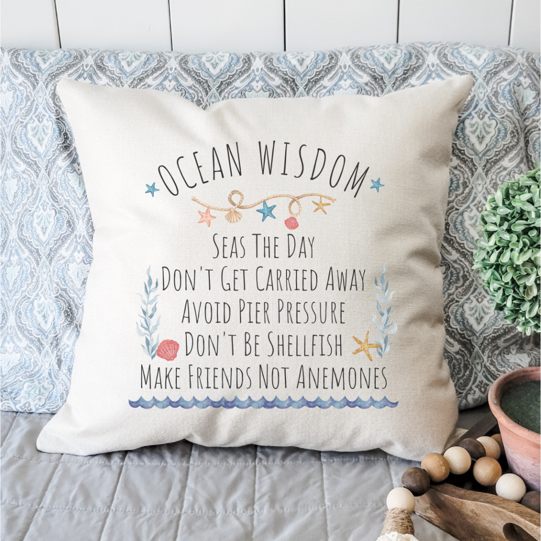 Coastal decorative throw pillow with ocean wisdom quotes for beach house decor.
