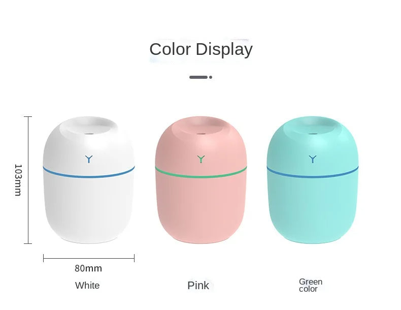 Mini humidifiers in white, pink, and green color options