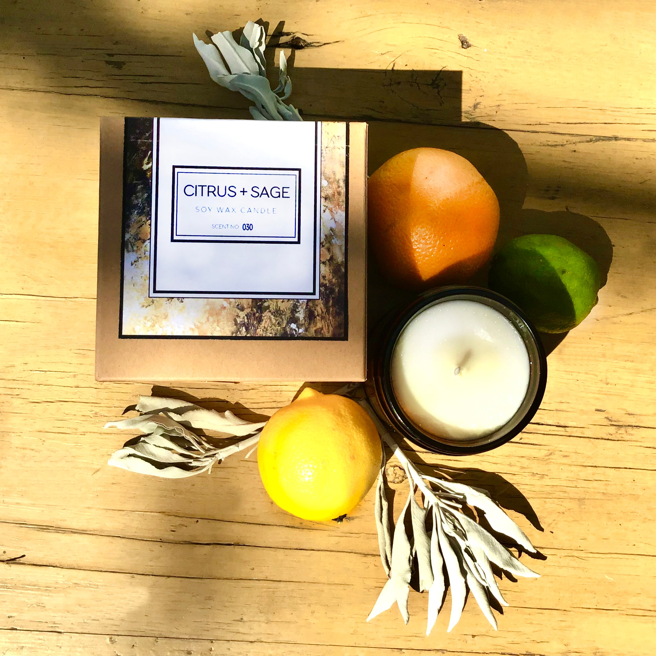 Citrus and sage soy candle with fresh lemon, lime, and orange fragrance.
