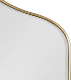 Elegant gold-framed arched wall mirror with smooth curved edges for modern home decor.

