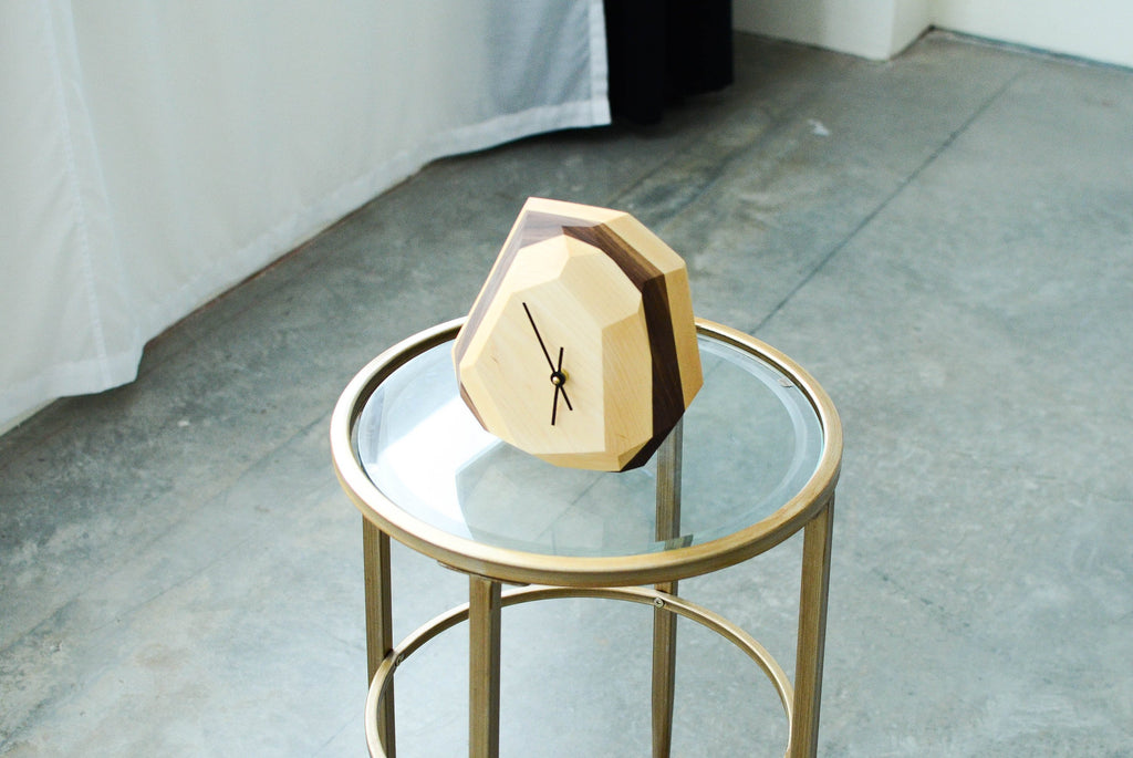 Geometric two-tone wooden desk clock with modern minimalist design.
