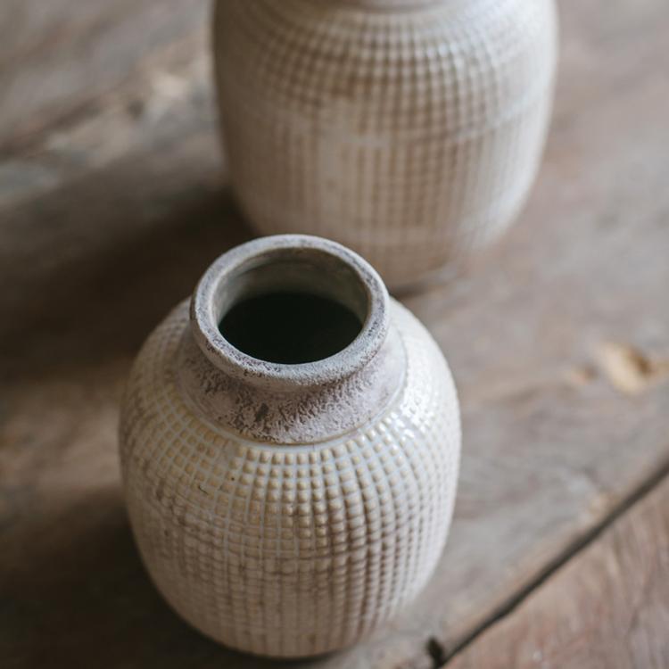 Rustic textured ceramic vase for dried flowers, greenery, and farmhouse home decor.
